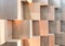 Wooden cube boxes creating abstract geometric wall