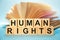Wooden cubes with the abbreviation Human Rights