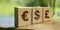 Wooden cubes with Euro, US dollar, Great Britain Pound signs. currency concept