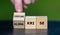 Wooden cubes form the German expressions \\\'Klima Krise\\\' and \\\'FlÃuechtlingskrise\\\'.