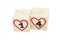 Wooden cubes with handwritten 14th and red hearts. Isolated.