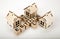 Wooden cubes with inscription real estate in the form of a crossword puzzle with three miniature houses