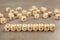 Wooden cubes with word Blacklist on grey table, closeup