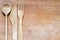 Wooden cutlery on cutting board abstract background