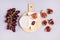 Wooden Cutting Board with Brie Cheese and Cutting Figs Ripe Grape and Figs Blue Background Top View Flat Lay Food or Snackfor Wine