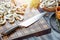 Wooden cutting board with chopped mushrooms