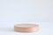 Wooden cylinder product podium on white background