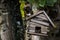 Wooden damaged birdhouse