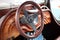 Wooden dashboard and steering wheel oldtimer