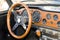 Wooden dashboard of a vintage car