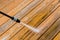 Wooden deck floor cleaning with high pressure water jet.