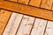 Wooden deck pattern partially stained transparent