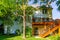 A wooden deck and staircase on a walkout basement house