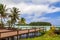 Wooden deck with sun loungers at Muri Beach, Rarotonga