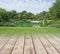 Wooden deck transitioning into beautiful green park