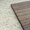 Wooden deck and white decorative stones
