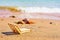 Wooden deckchair on a tropical sand beach.