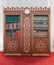 Wooden decorated bookcase full of religious books, Fatih Mosque, Istanbul, Turkey