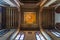 Wooden decorated dome mediating ornate ceiling with floral pattern decorations at al Ghuri Mausoleum, Cairo, Egypt