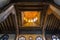 Wooden decorated dome mediating ornate ceiling with floral pattern decorations at Sultan al Ghuri Mausoleum, Cairo, Egypt