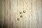 Wooden dice lying down at wooden table background