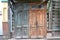 The wooden dilapidated doors. Old entrances in Irkutsk
