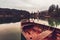 Wooden dinghy rowboat on lake