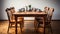 a wooden dining table and chairs in a clean, well-lit environment with a white background