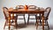 a wooden dining table and chairs in a clean, well-lit environment with a white background