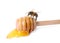 Wooden dipper with honey and bee