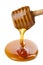 Wooden dipper with honey isolated