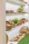 Wooden dishes. Kitchen utensils and accessories made of bamboo. Eco-friendly products. Various salad bowls, dishes, plates, food
