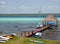 Wooden Dock with Boats on Tropical Lake Bacalar