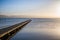 Wooden dock at the Gulf of Cariaco at sunset.