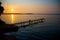 Wooden dock on a lake during a beautiful sunrise in the morning in Madison, Wisconsin
