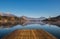 A wooden dock, pier, on a lake