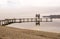 Wooden Dock With Shore During Winter Season