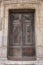 Wooden door of ancient church in Lisbon, Portugal. Historical building details. Old house. Vintage stone cathedral.