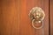 Wooden door with antique door knocker