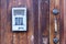 Wooden door with electronic combination lock. Hotel door handle with electronic security number system