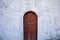 Wooden door of a hermitage in the town \\\