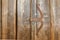 Wooden door made of barn wood with rustic vintage handle