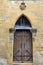 Wooden door in the medieval house