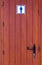 Wooden door of mens toilet