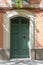 Wooden door and modernist faÃ§ade in Barcelona, Spain