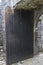 Wooden door stands open, Aughnanure Castle, near Oughterard