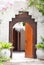 Wooden door of the tropical garden villa