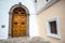 Wooden door and window of the Sagrario church