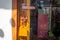 Wooden doors with glass hanging, Japanese wooden signs in front of the cafe.