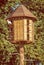 Wooden dovecote with pigeons in forest